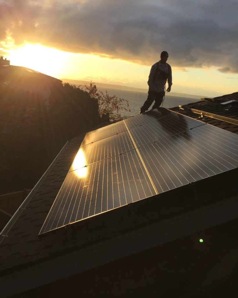 Solar panel array installed on an Edmonds, WA waterfront home by Pinnacle Roofing Professionals