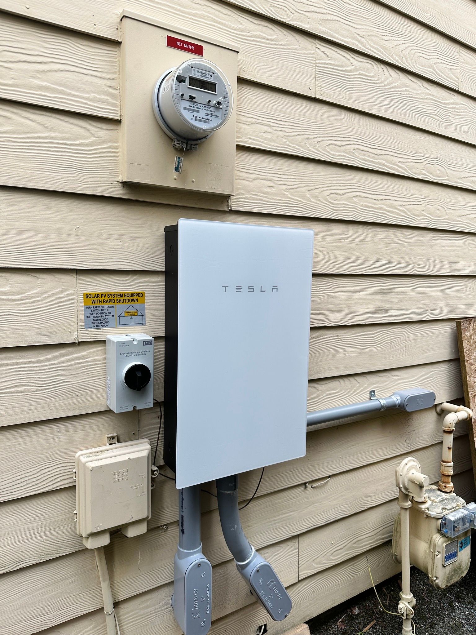 Tesla Solar Roof project detail showing tile alignment and roofline integration in Bellevue, WA
