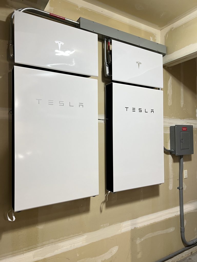 Completed Bothell solar and energy storage project featuring rooftop solar panels and Tesla Powerwall batteries