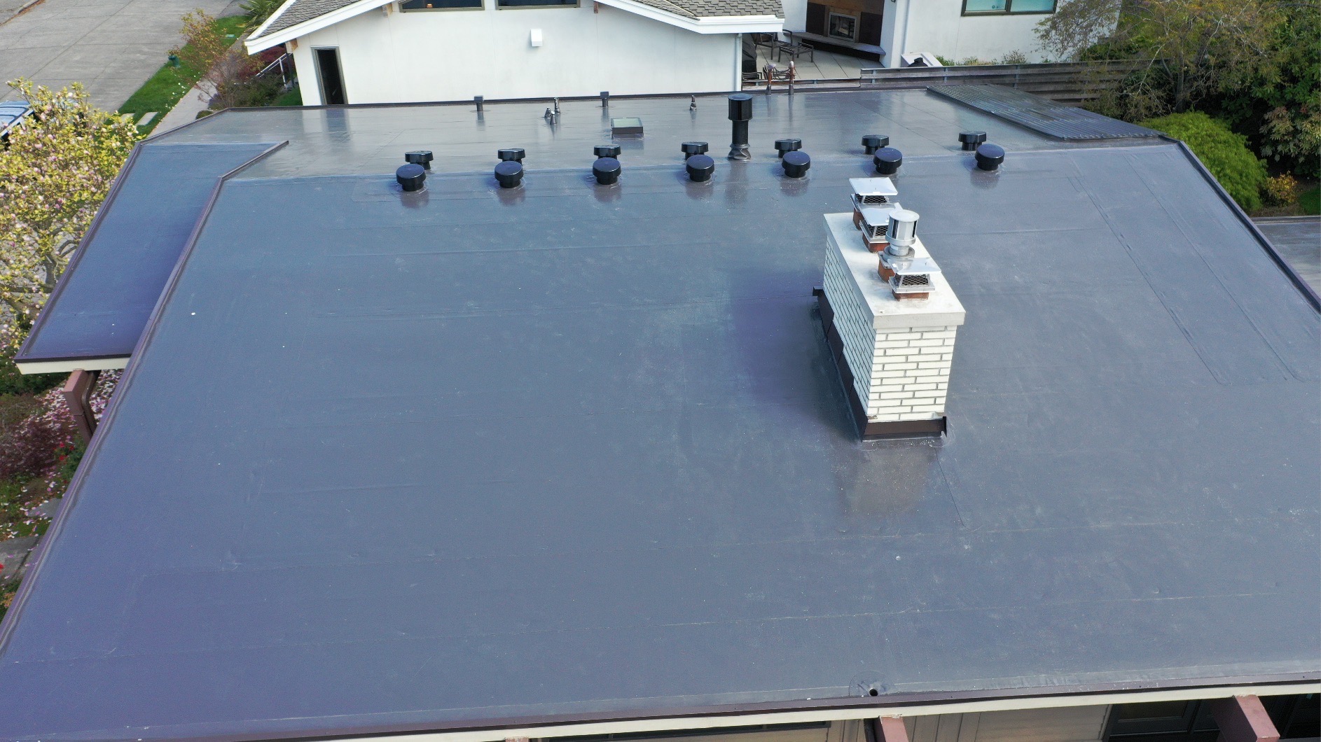 IB PVC roofing membrane detail on Seattle low-slope roof installed by Pinnacle Roofing Professionals