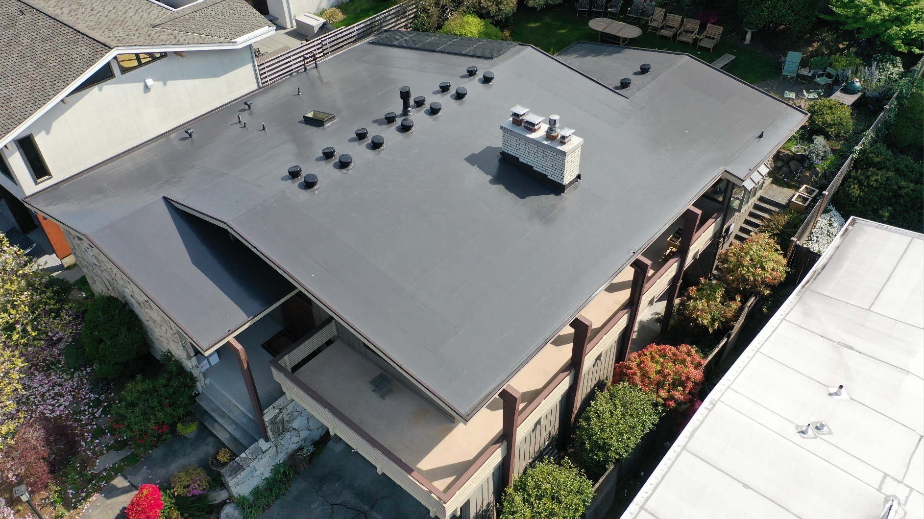 Seattle flat roof before IB PVC roof replacement by Pinnacle Roofing
