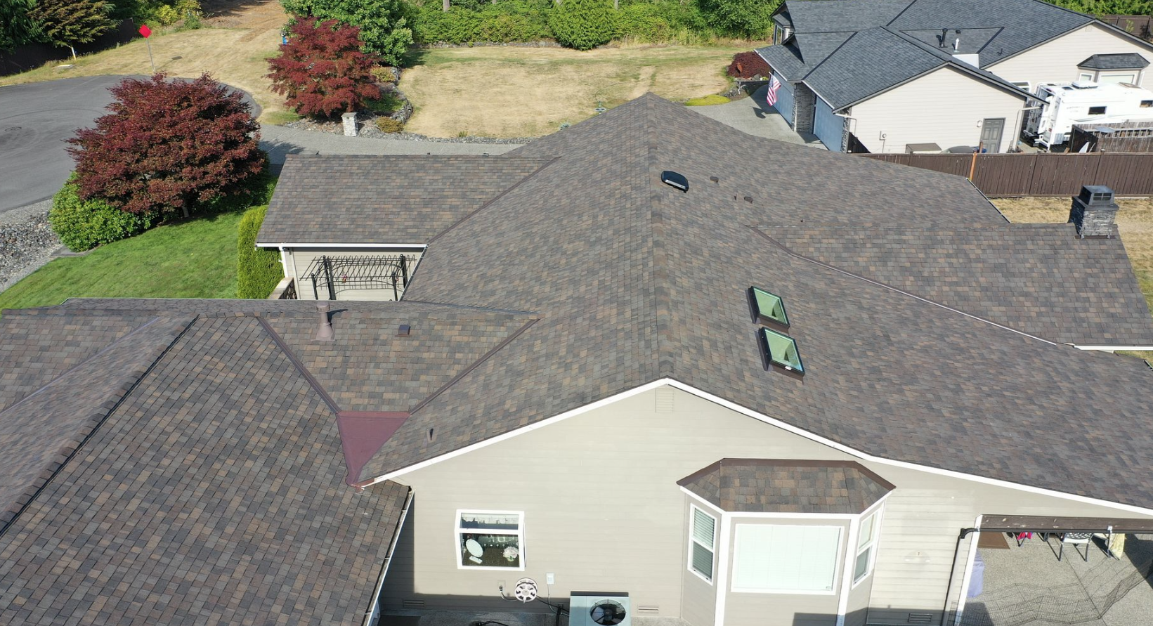 PVC membrane dead valley drainage repair during Lake Stevens roofing project