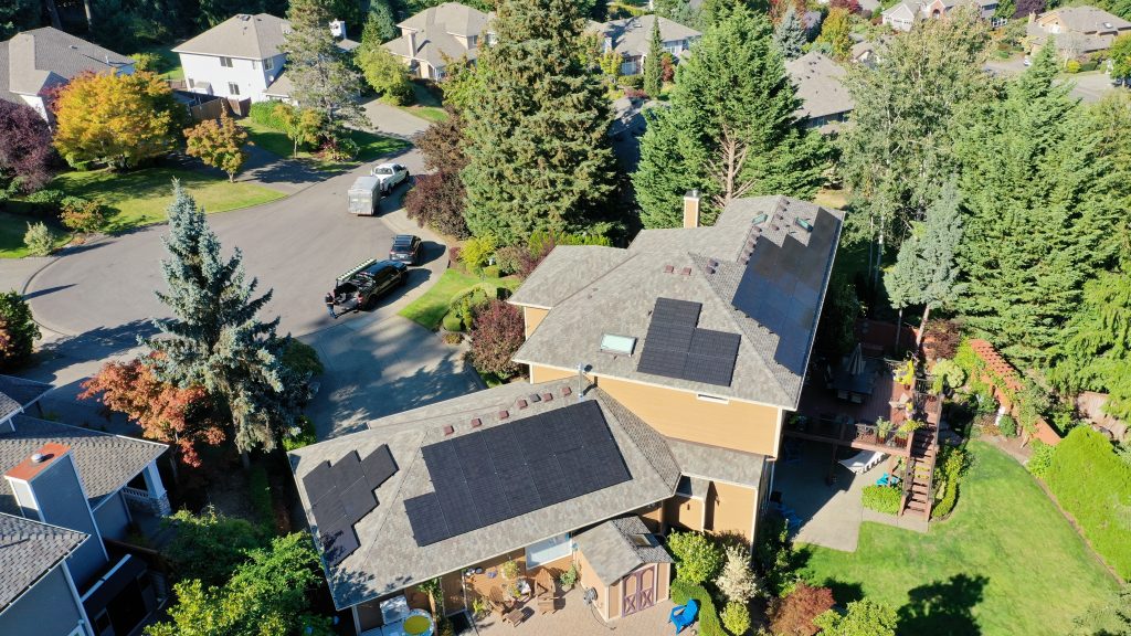 Aerial look at the complete roof on this Renton, WA home — Presidential Shake shingles in Country Gray paired with solar arrays.