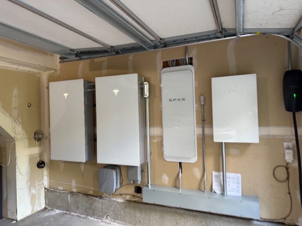 SPAN smart electrical panel, conduit, and Tesla Wall Connector EV charger for a Leschi Seattle solar installation