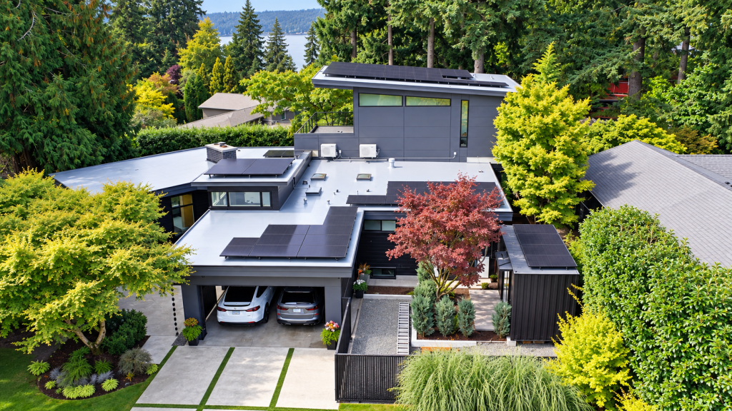 Aerial view of Bellevue Enatai area home with new PVC roof and solar installation