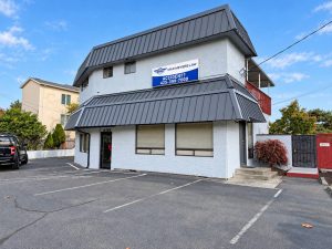 Thumbnail of site-wide view of Lake Forest Park commercial building after mansard roof replacement