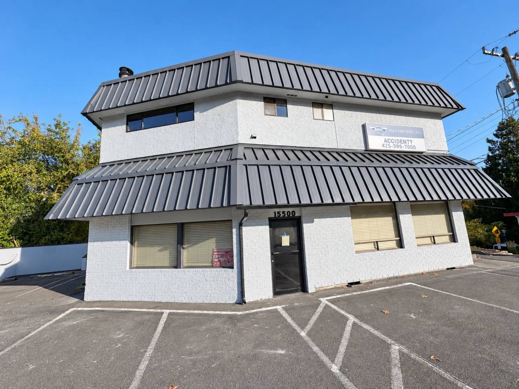 Commercial mansard roof replacement in Lake Forest Park, WA — Nu-Ray Series 2000 standing seam in Cascade Gray